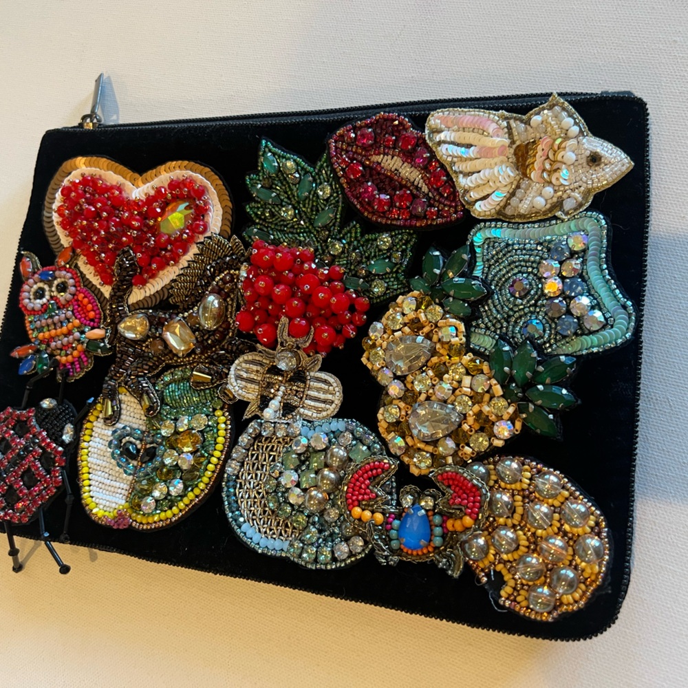 beaded clutch on black velvet background
